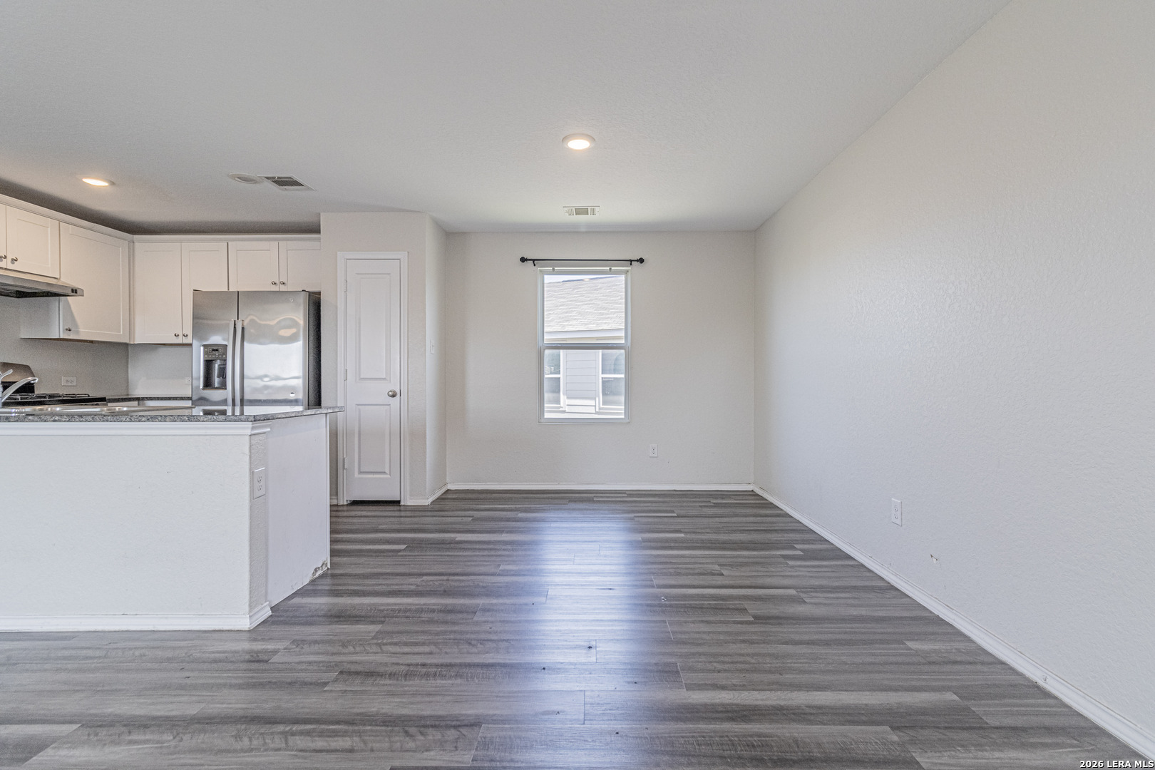 3814 Pickles Way Converse, TX 78109 - Photo 9 of 27 a view of kitchen with wooden floor and electronic appliances