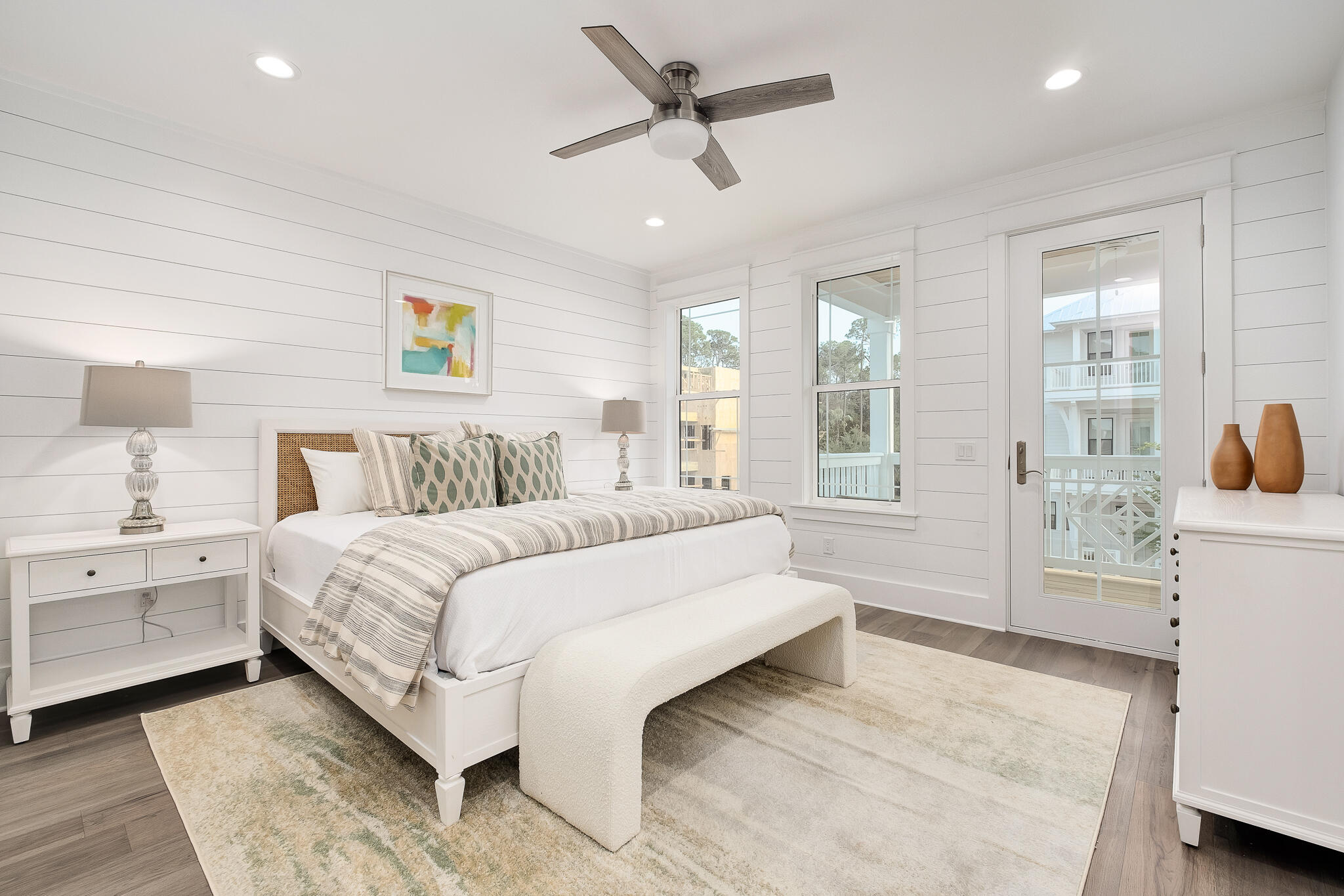 186 Redbud Ln Inlet Beach Inlet Beach, FL 32461 - Photo 20 of 46 a spacious bedroom with a large bed and a chandelier