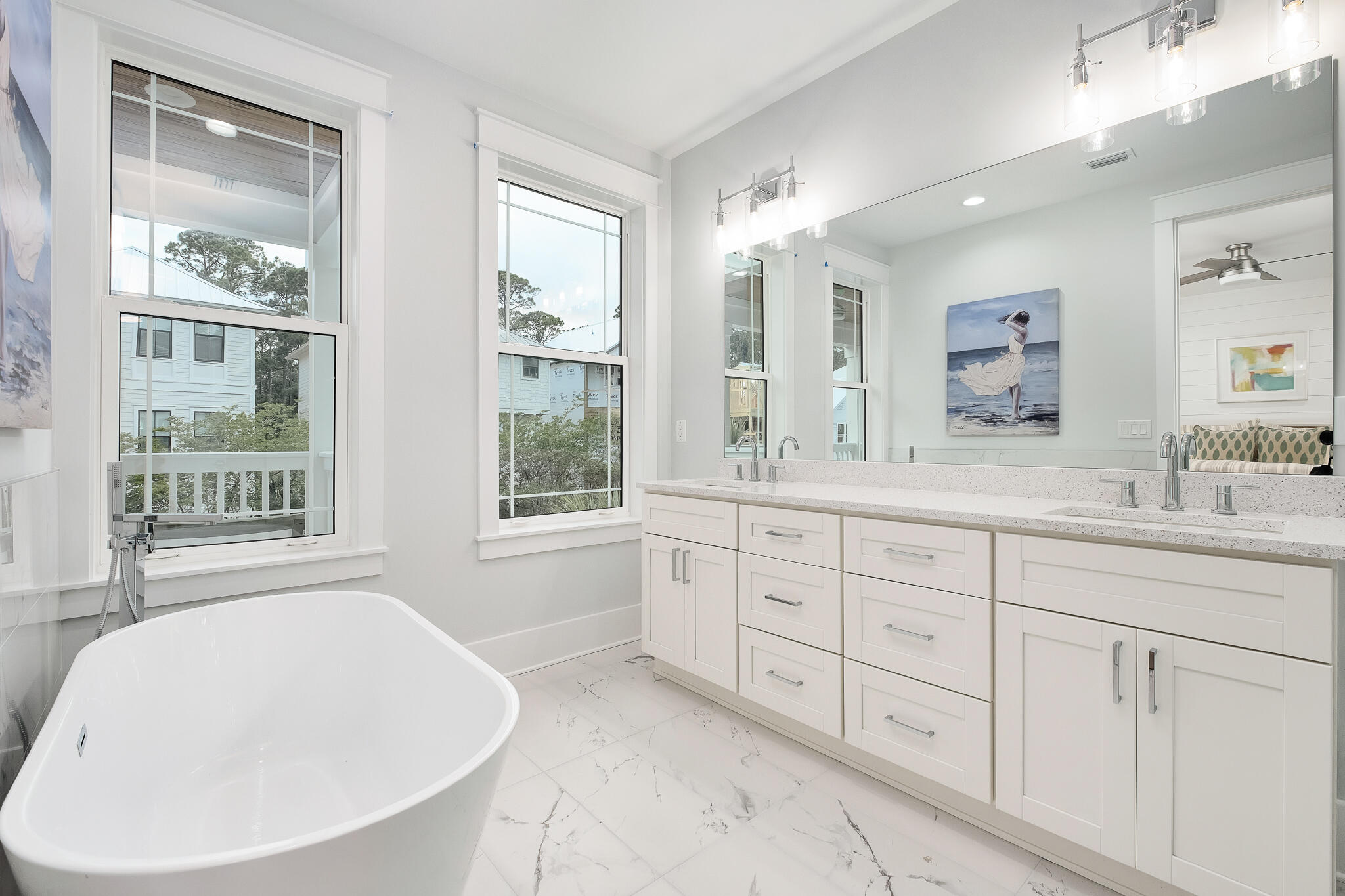 186 Redbud Ln Inlet Beach Inlet Beach, FL 32461 - Photo 24 of 46 a spacious bathroom with double vanity sink a two mirror a window and a bathtub