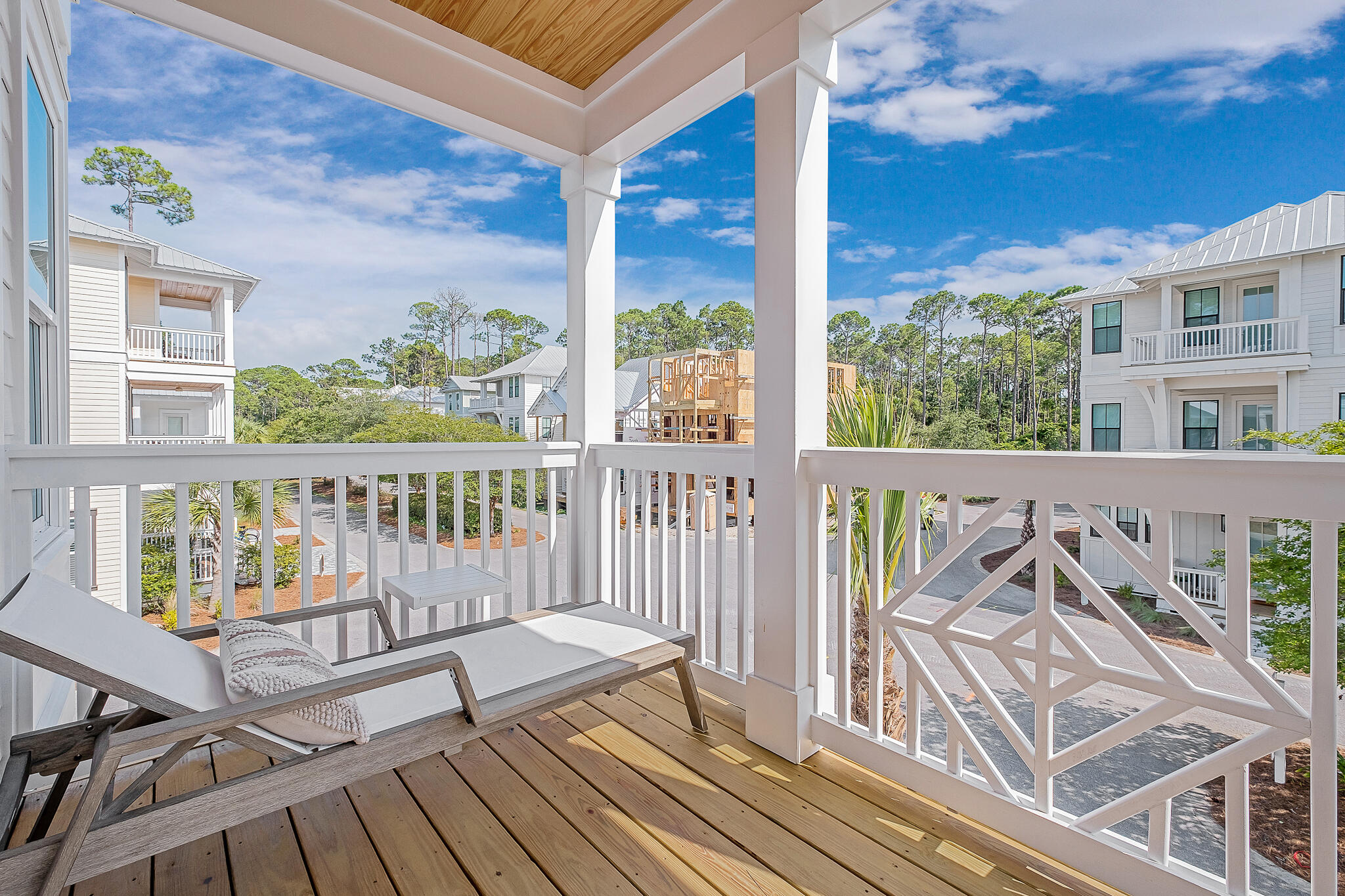 186 Redbud Ln Inlet Beach Inlet Beach, FL 32461 - Photo 31 of 46 a view of a two chairs and table on the deck