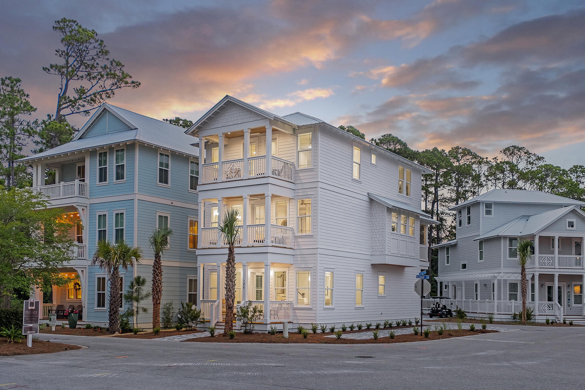 186 Redbud Ln Inlet Beach Inlet Beach, FL 32461 - Photo 36 of 46 a front view of a residential apartment building with a yard