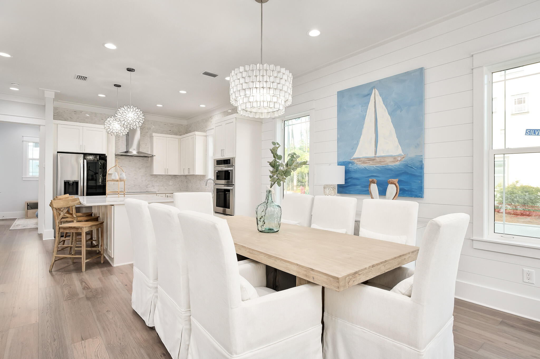186 Redbud Ln Inlet Beach Inlet Beach, FL 32461 - Photo 5 of 46 a view of kitchen with refrigerator and wooden floor