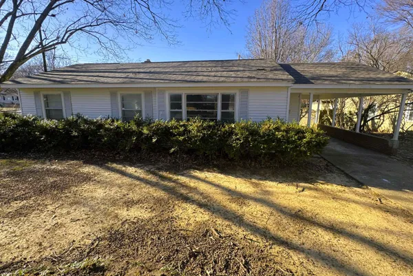 a view of a house with garden