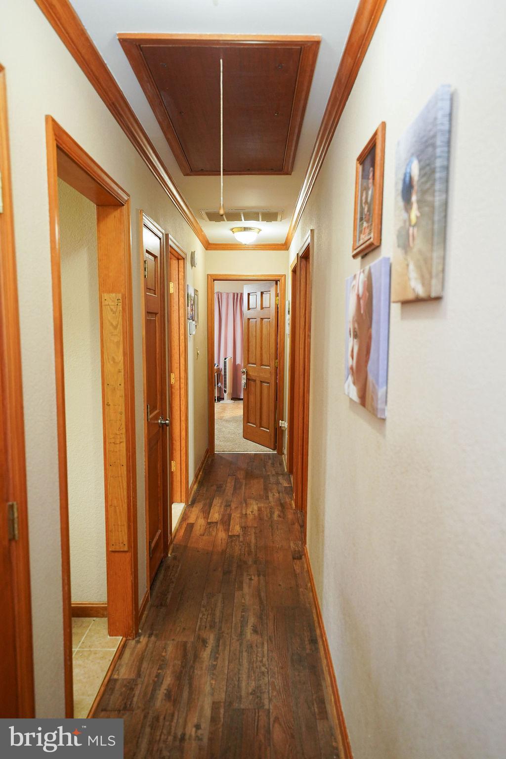 9137 Logtown Road Berlin, MD 21811 - Photo 7 of 59 Hallway leading to the main Bedrooms