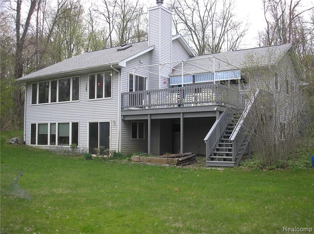 3901 Lee Hill new of back of home.jpg