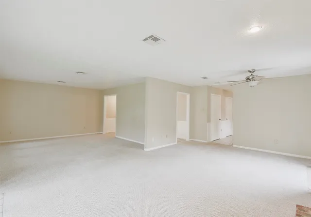 a view of cabinets and window