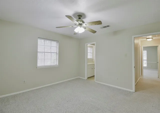a bathroom with a sink mirror toilet and bathtub