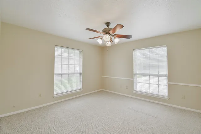 a front view of a house with a yard and porch