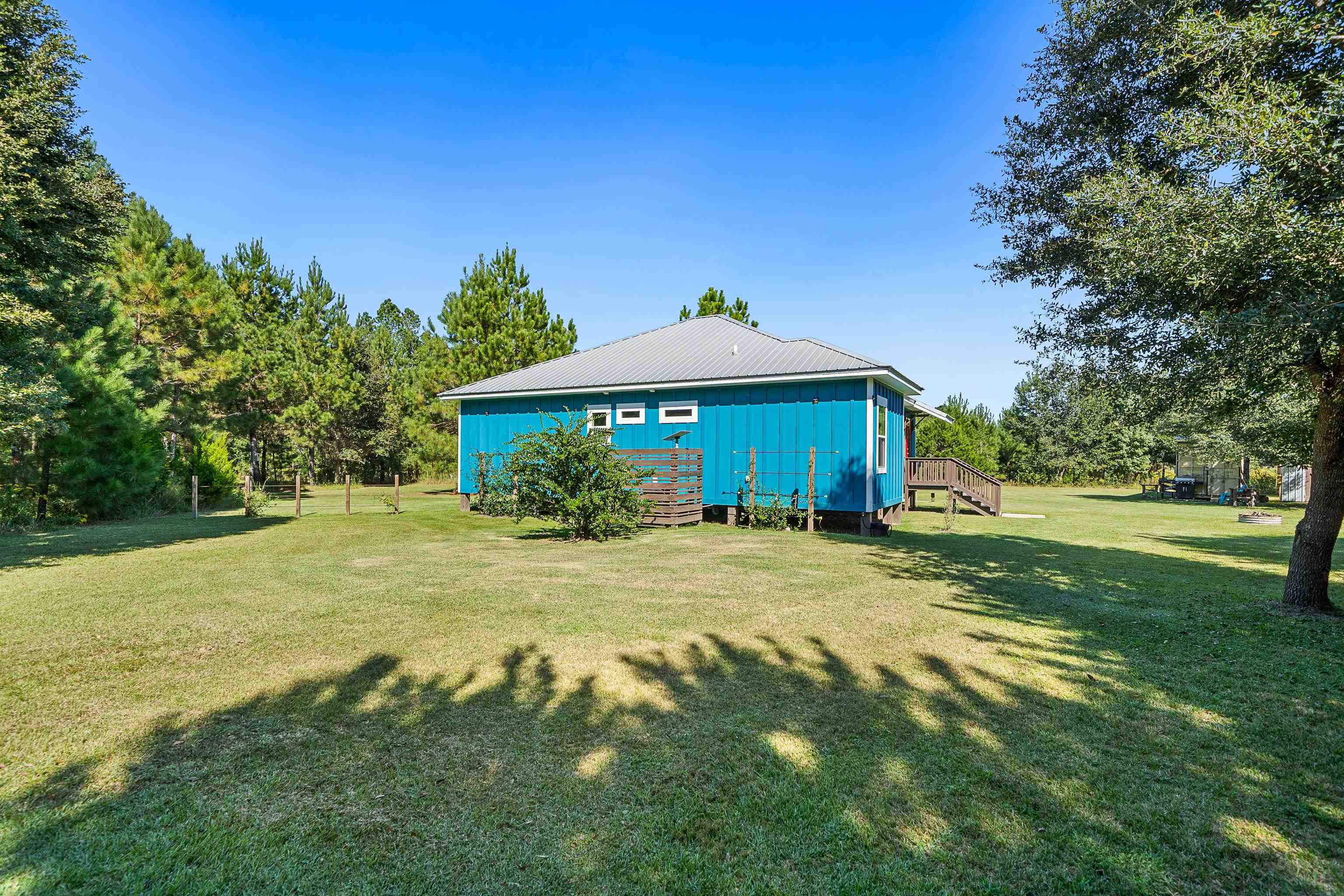 24616 Bretz Lane Elberta, AL 36530 - Photo 37 of 42 Certified FORTIFIED Silver Home (IBHS 2025) surrounded by mature trees for privacy.