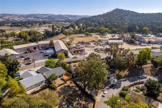 an aerial view of residential house with outdoor space