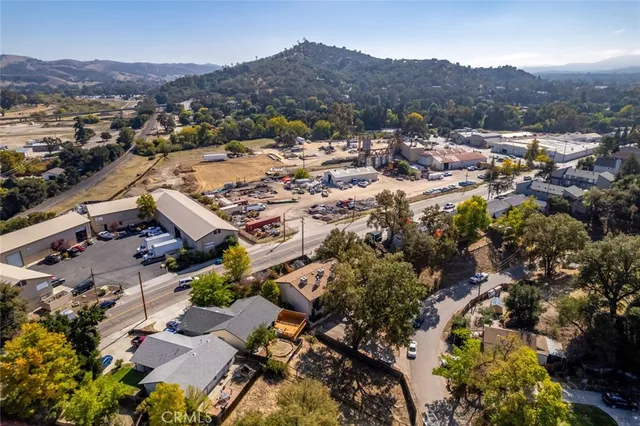 an aerial view of residential house and green space