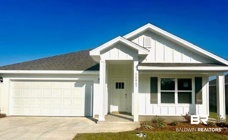 32063 Lyon Road Daphne, AL 36527 - Photo 1 of 4 View of front of home with a garage