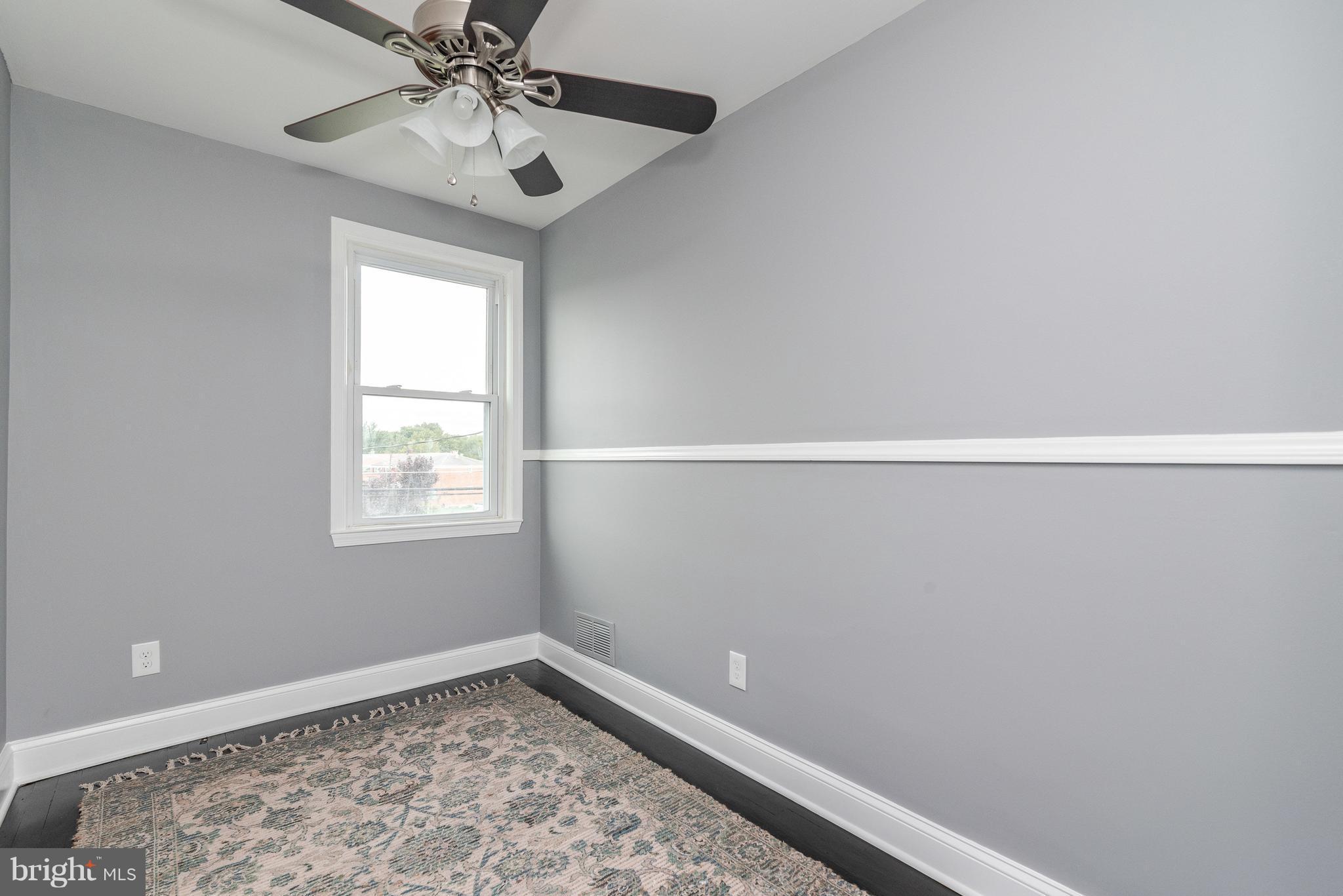 700 Aldworth Road Baltimore, MD 21222 - Photo 14 of 30 a view of an empty room with a window