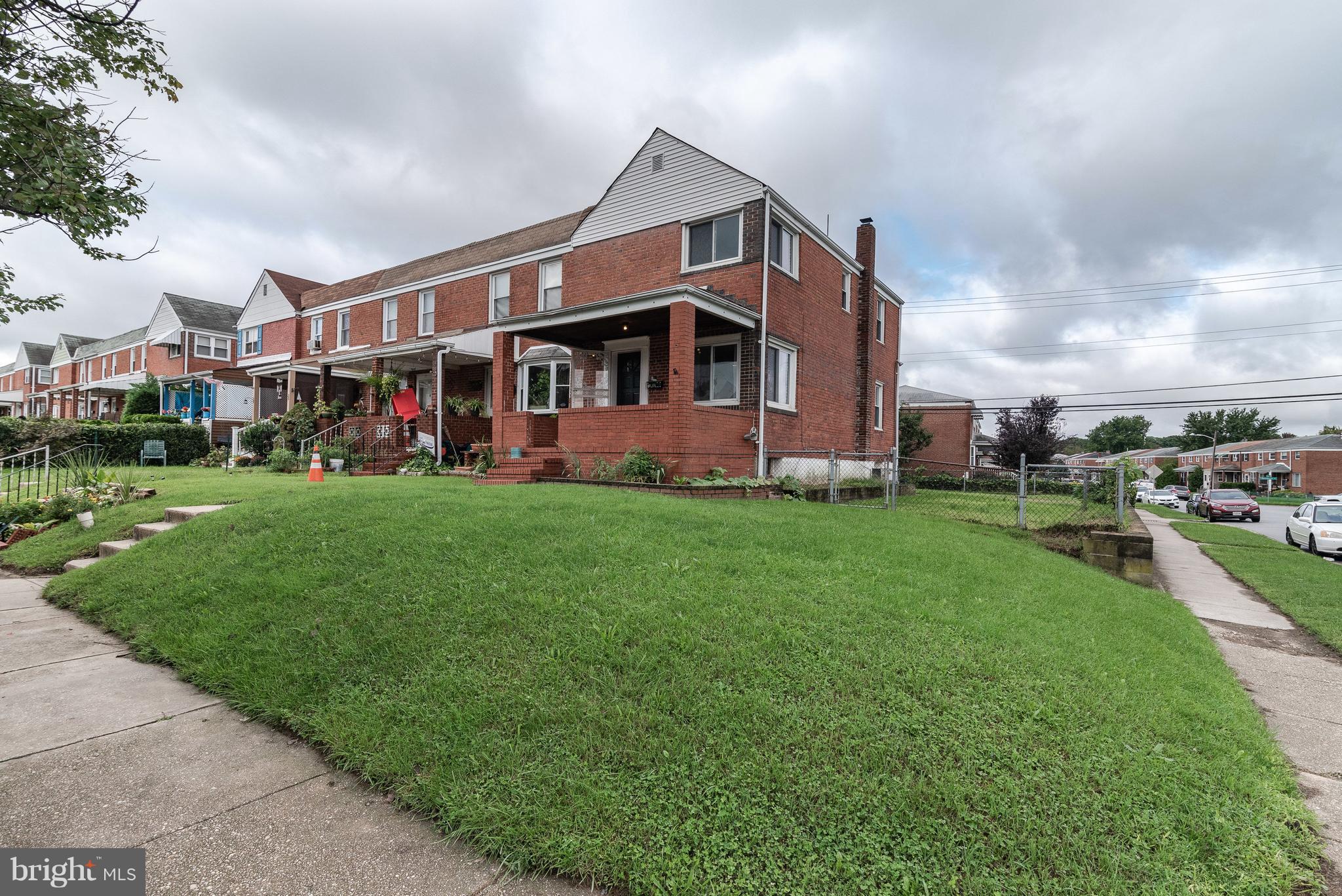 700 Aldworth Road Baltimore, MD 21222 - Photo 27 of 30 a front view of a house with garden