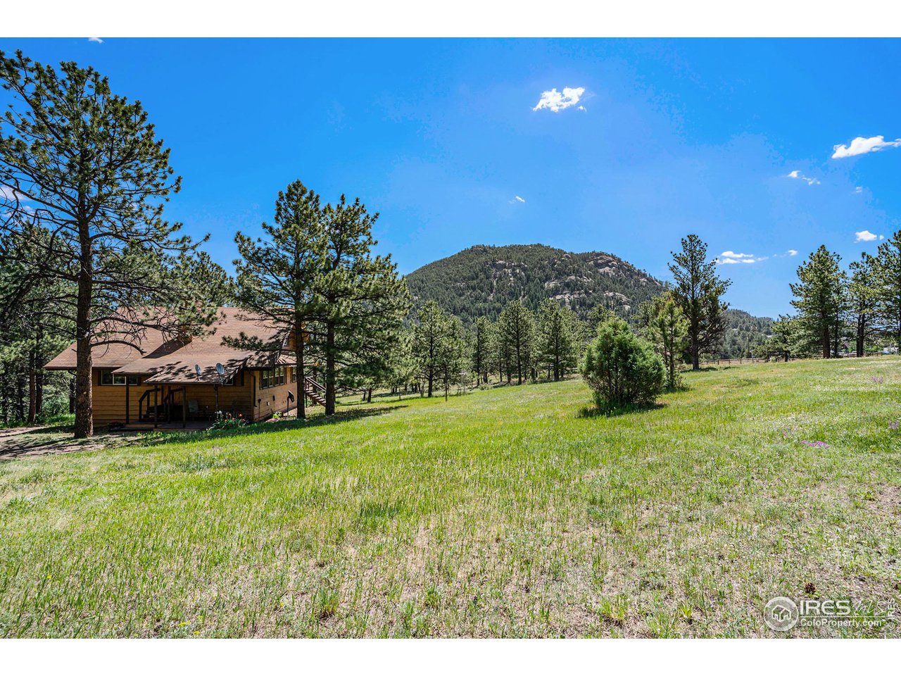 372 Cherokee Road Lyons, CO 80540 - Photo 1 of 33 a view of a field of the house