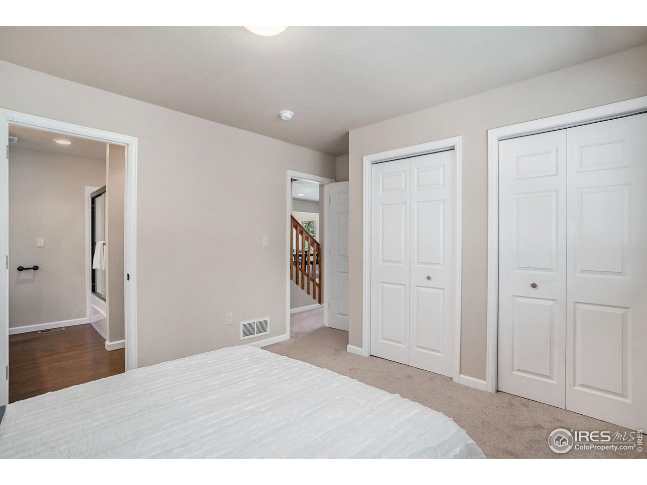 372 Cherokee Road Lyons, CO 80540 - Photo 12 of 33 a big room with closet and wooden floor