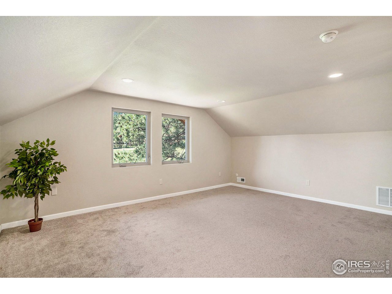 372 Cherokee Road Lyons, CO 80540 - Photo 16 of 33 a view of an empty room with a window