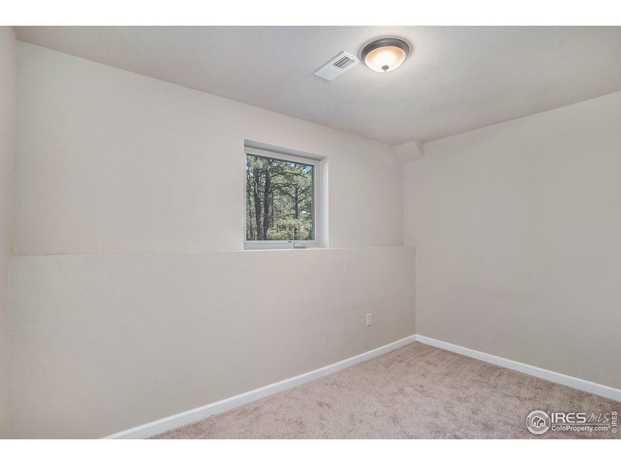 372 Cherokee Road Lyons, CO 80540 - Photo 17 of 33 a view of an empty room