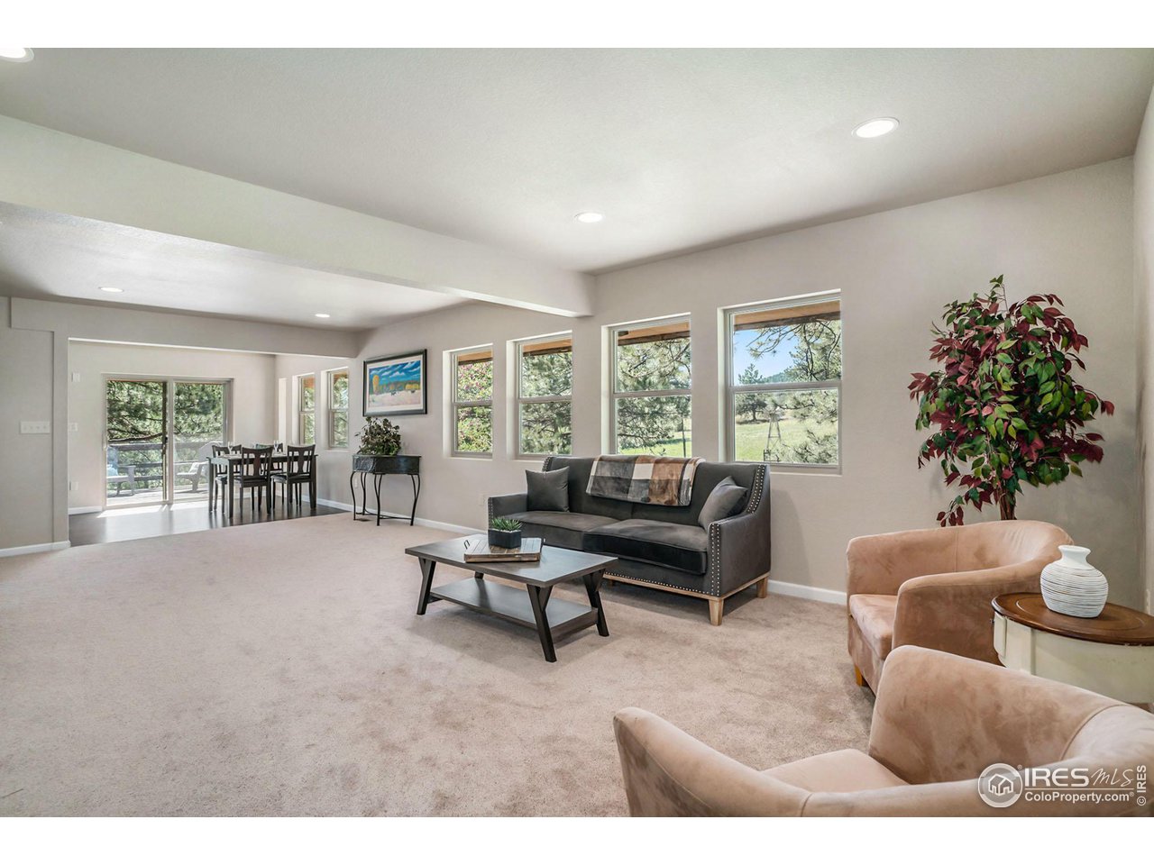 372 Cherokee Road Lyons, CO 80540 - Photo 4 of 33 a living room with furniture and a large window