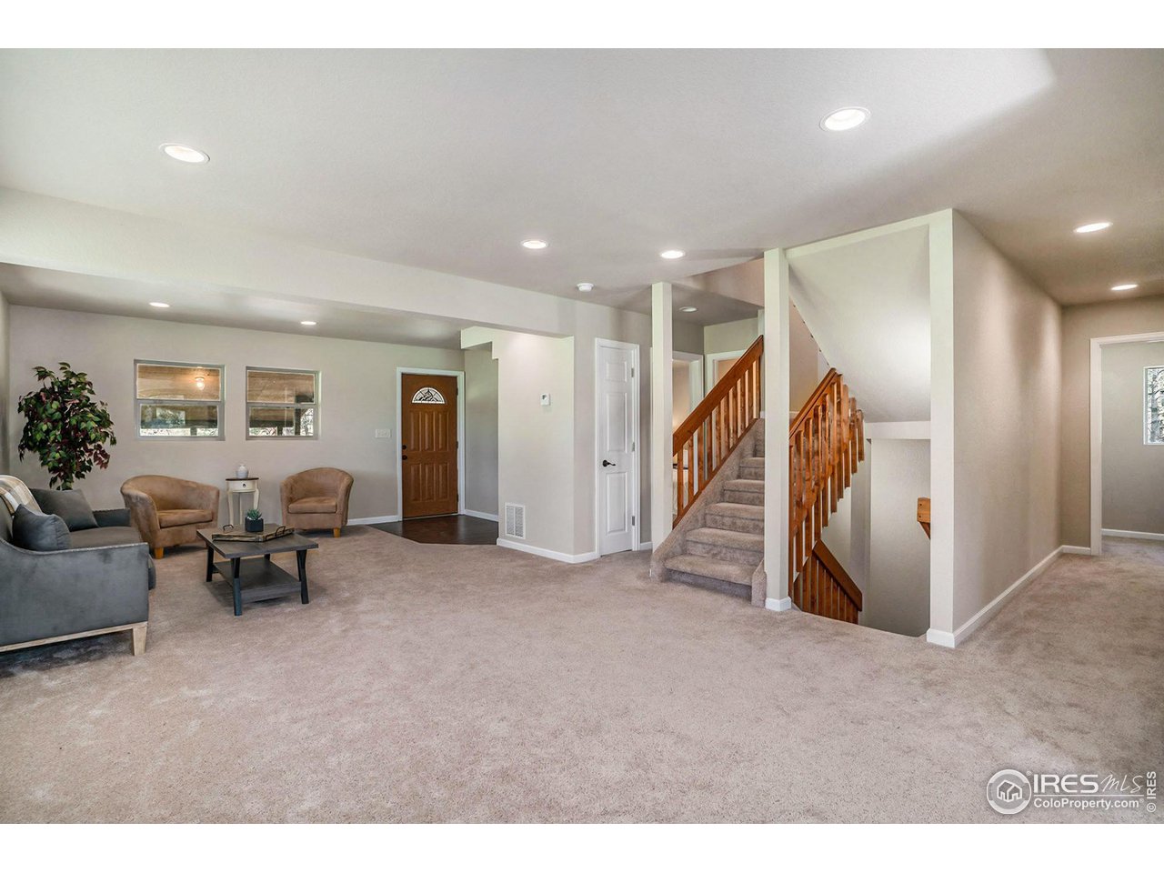 372 Cherokee Road Lyons, CO 80540 - Photo 5 of 33 a living room with furniture and a wooden floor