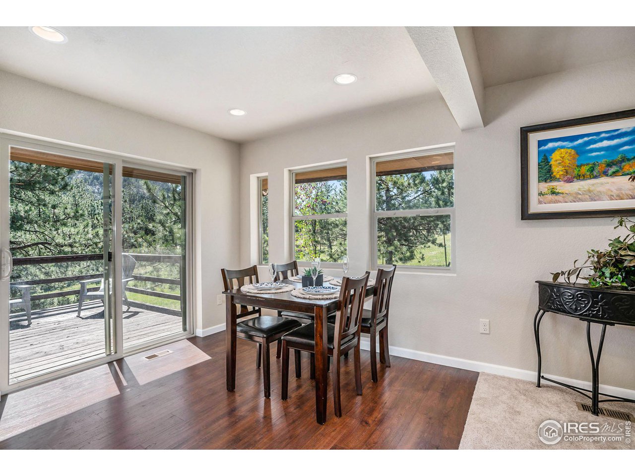 372 Cherokee Road Lyons, CO 80540 - Photo 6 of 33 a view of a dining room with furniture window and outside view