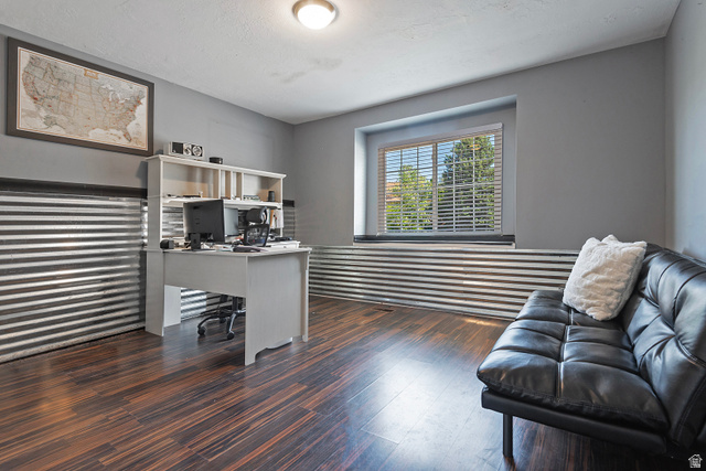 3310 Creek Road Salt Lake City, UT 84121 - Photo 28 of 49 Room featuring wood-finish flooring, corrugated metal wainscoting, and a window with blinds