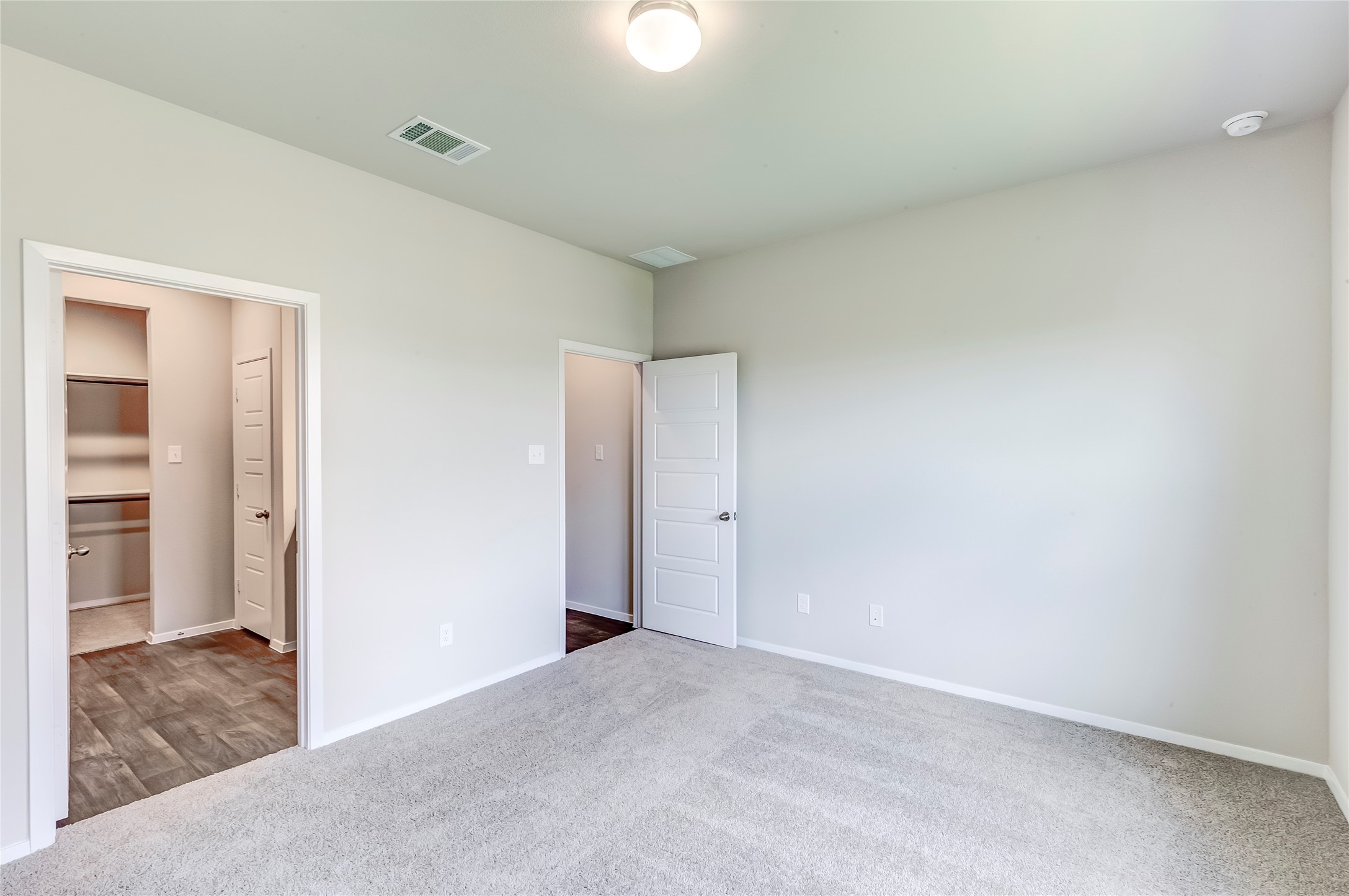 274 Jade Street Maxwell, TX 78656 - Photo 8 of 36 an empty room with closet and a bathroom