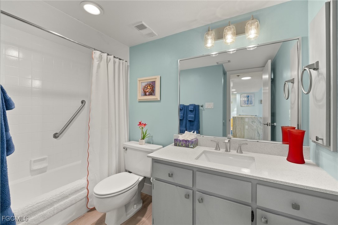3170 Matecumbe Key Road, Unit 134 Punta Gorda, FL 33955 - Photo 26 of 31 a bathroom with a sink a toilet and shower