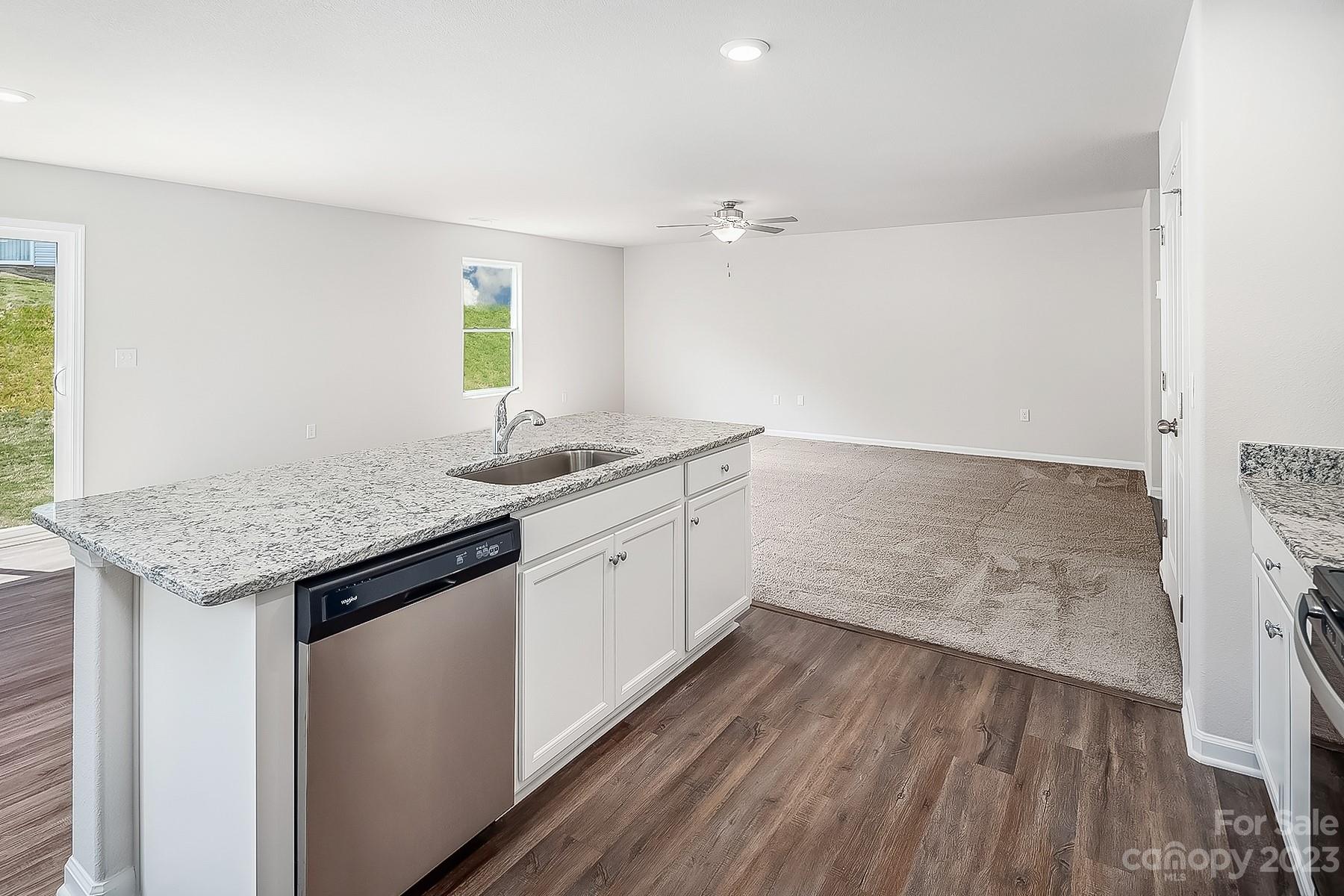 1341 Nia Road Charlotte, NC 28215 - Photo 6 of 15 a kitchen with a sink and cabinets
