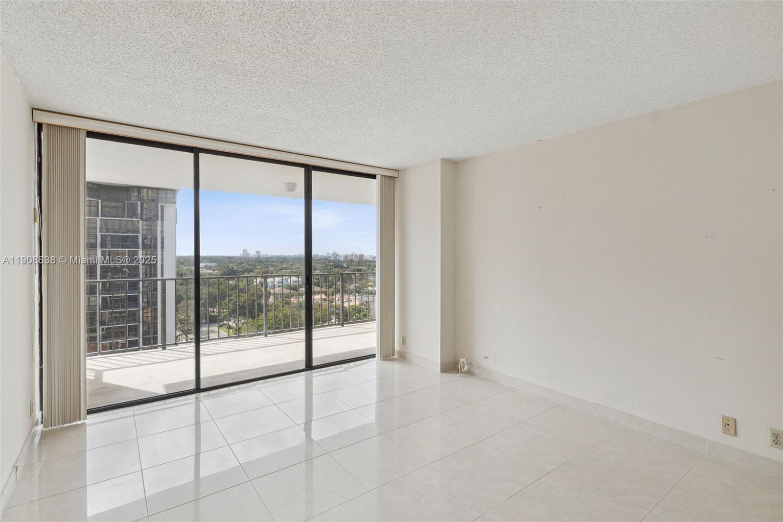 1901 Brickell Avenue, Unit B1408 Miami, FL 33129 - Photo 18 of 37 a view of an empty room and window