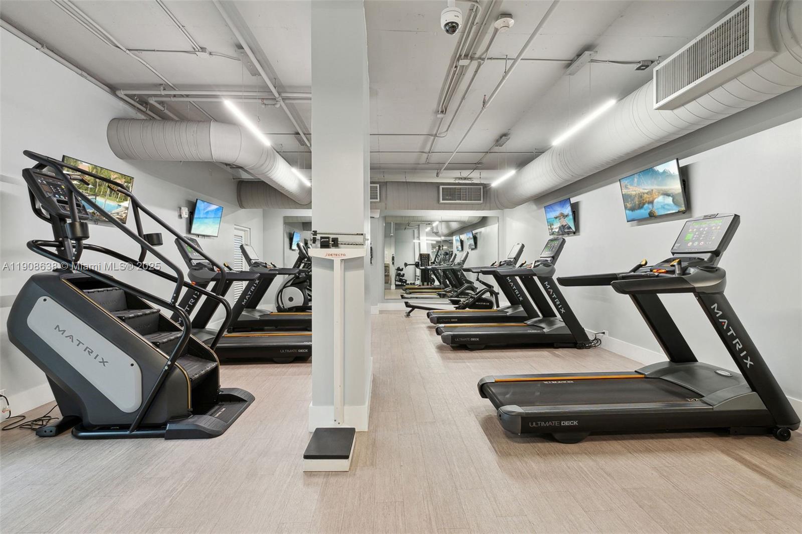 1901 Brickell Avenue, Unit B1408 Miami, FL 33129 - Photo 26 of 37 a view of a room with gym equipment