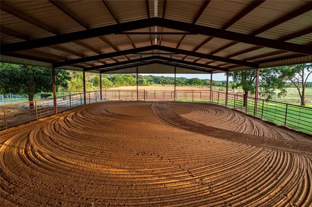 a view of a swimming pool with a patio