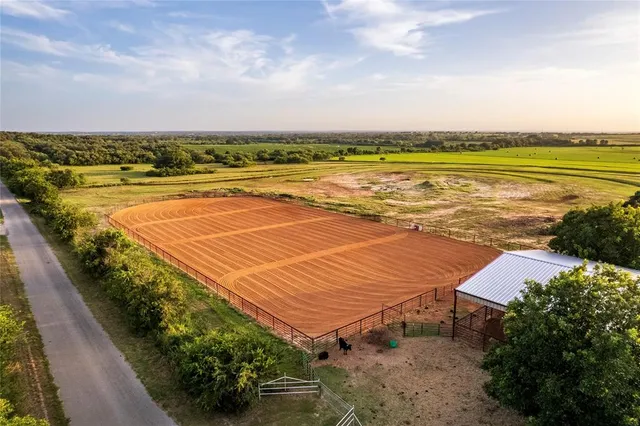an aerial view of a houses with outdoor space