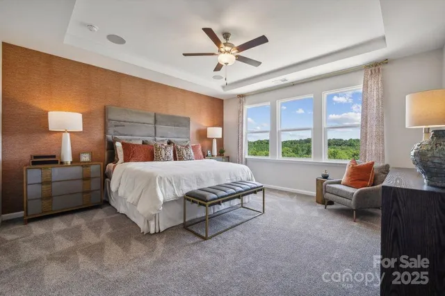 a bed room with a bed and a couch