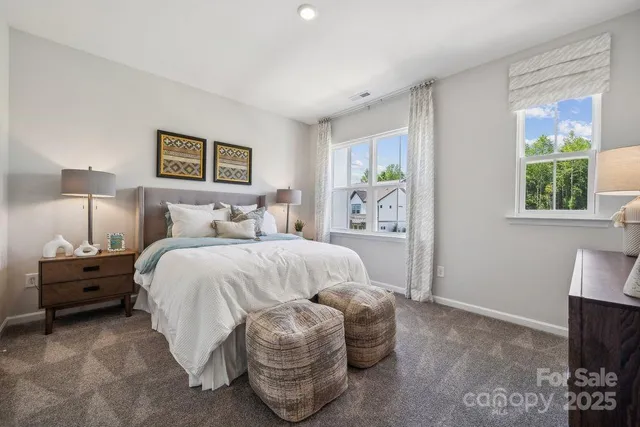 a bathroom with a double vanity sink a vanity and a mirror