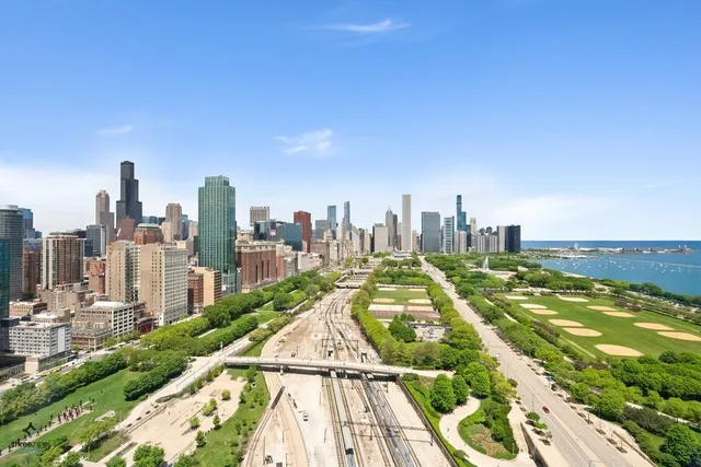 a view of a city with tall buildings