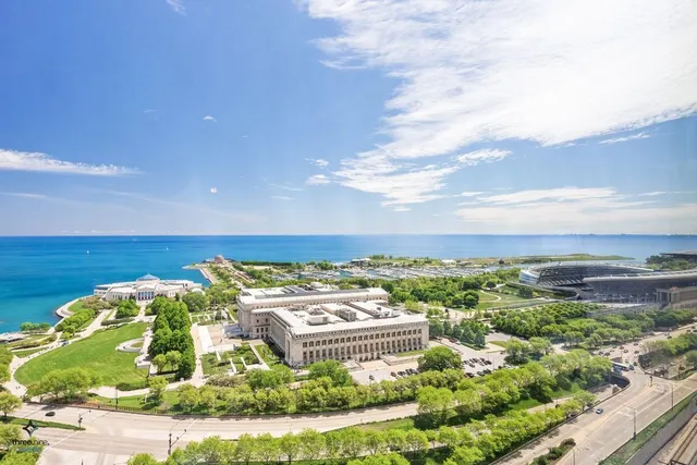 an aerial view of a house with a garden