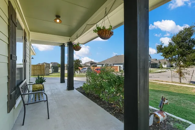 a view of swimming pool from a balcony