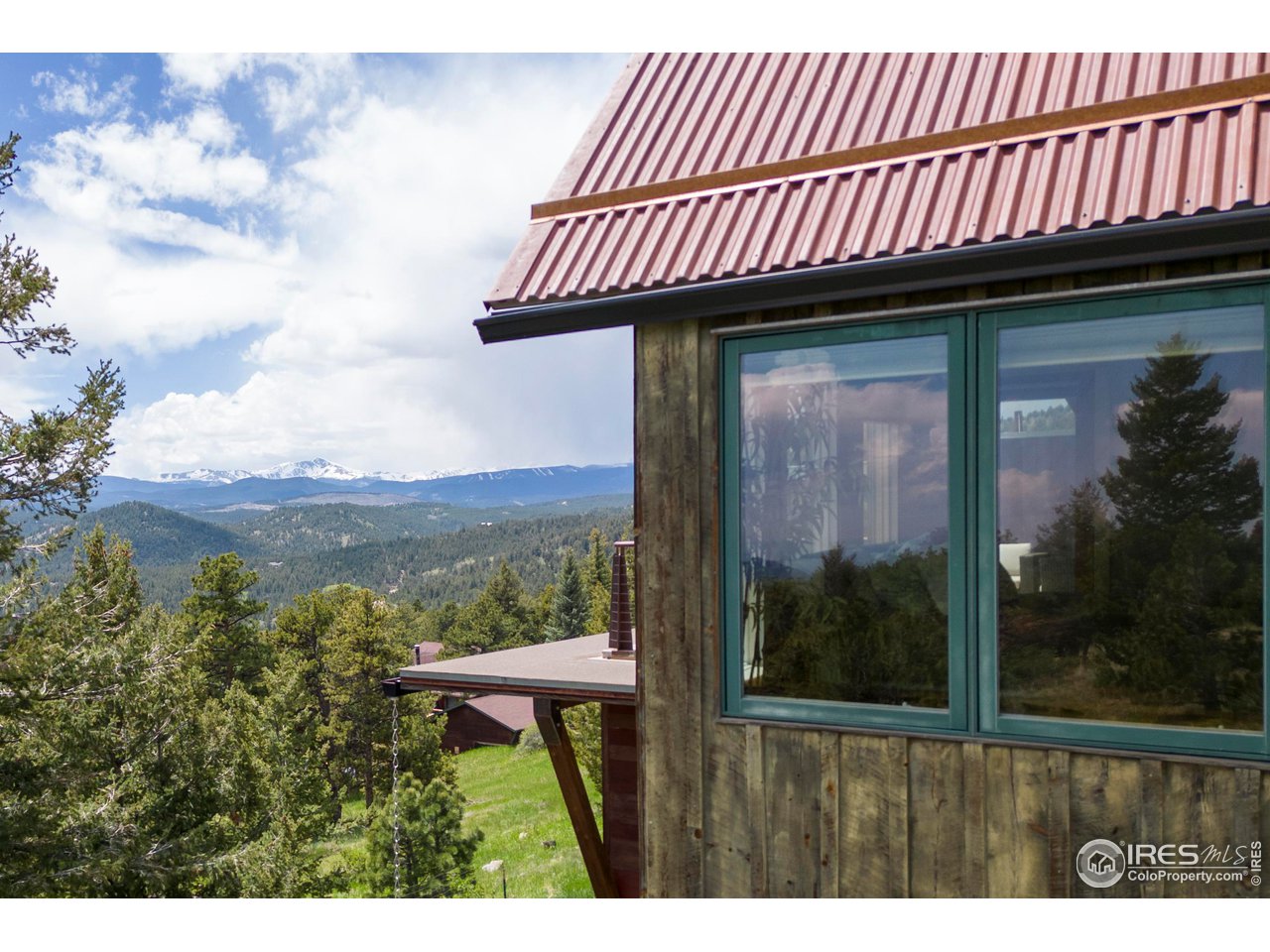 340 South Peak Road Boulder, CO 80302 - Photo 3 of 40 Primary bedroom boasts direct views of Indian Peaks.