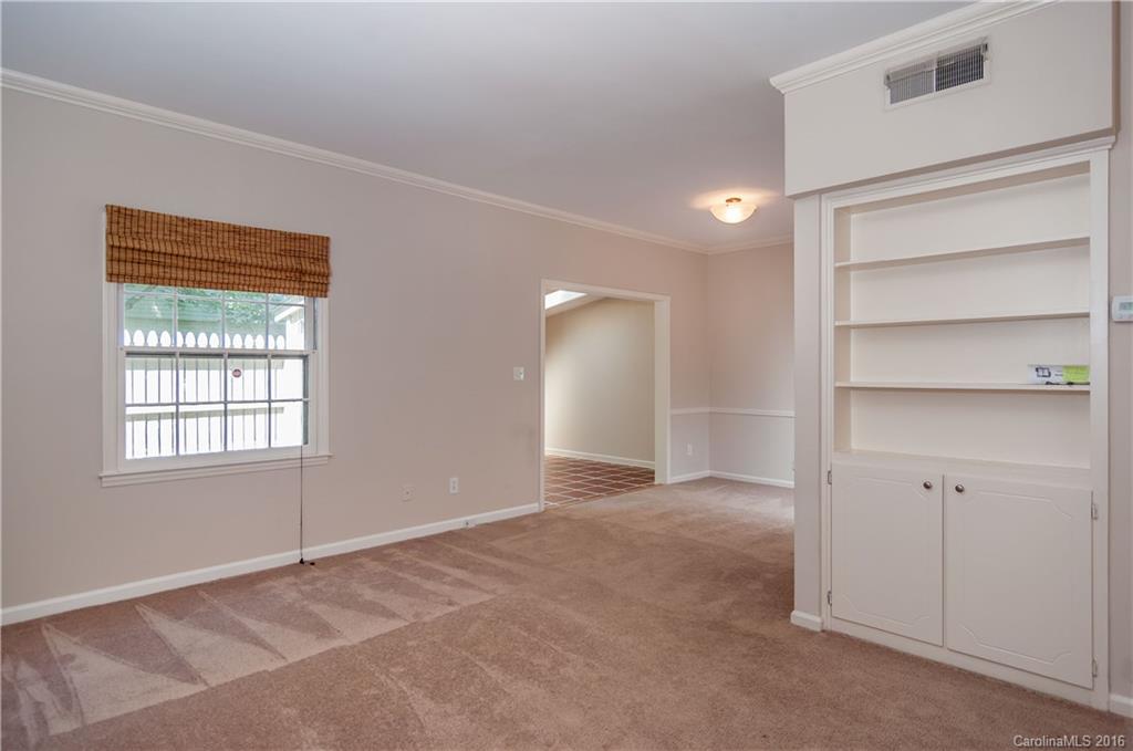 5945 Quail Hollow Road, Unit A Charlotte, NC 28210 - Photo 2 of 19 a view of an empty room with a window