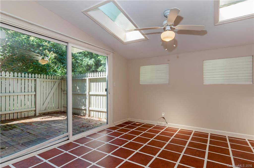 5945 Quail Hollow Road, Unit A Charlotte, NC 28210 - Photo 11 of 19 a view of an empty room with a window