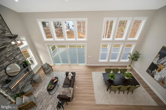 a spacious bedroom with a bed and a table