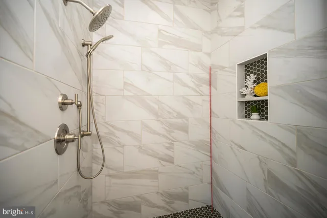 a kitchen with a refrigerator and a sink