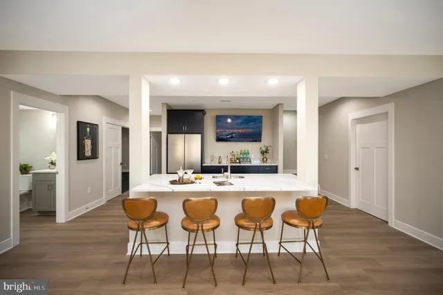 an empty room with a empty space and windows