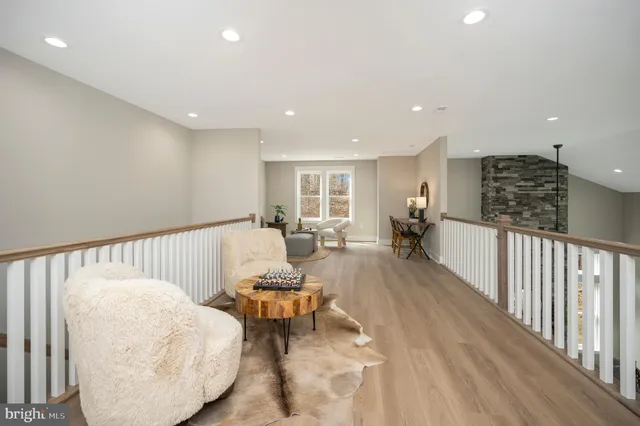 swimming pool view with a lake view