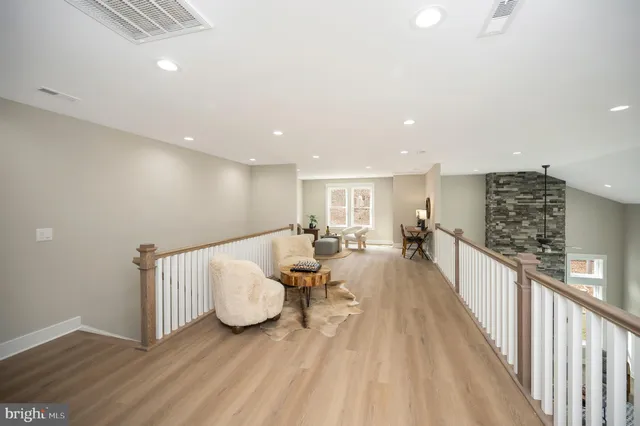 a view of a house with pool and garden