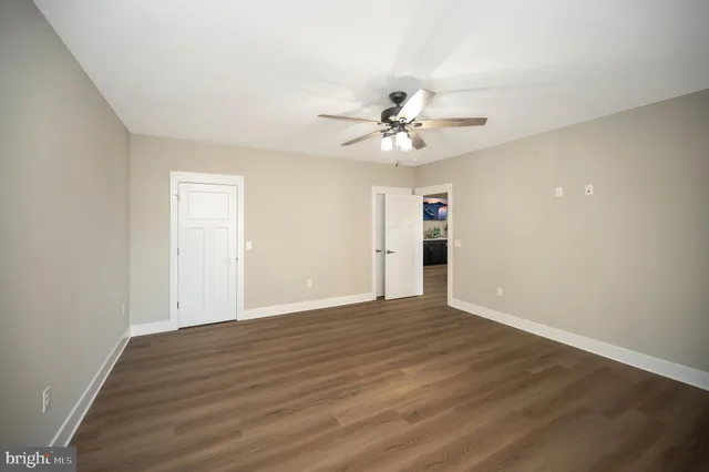 an aerial view of a house with outdoor space and lake view