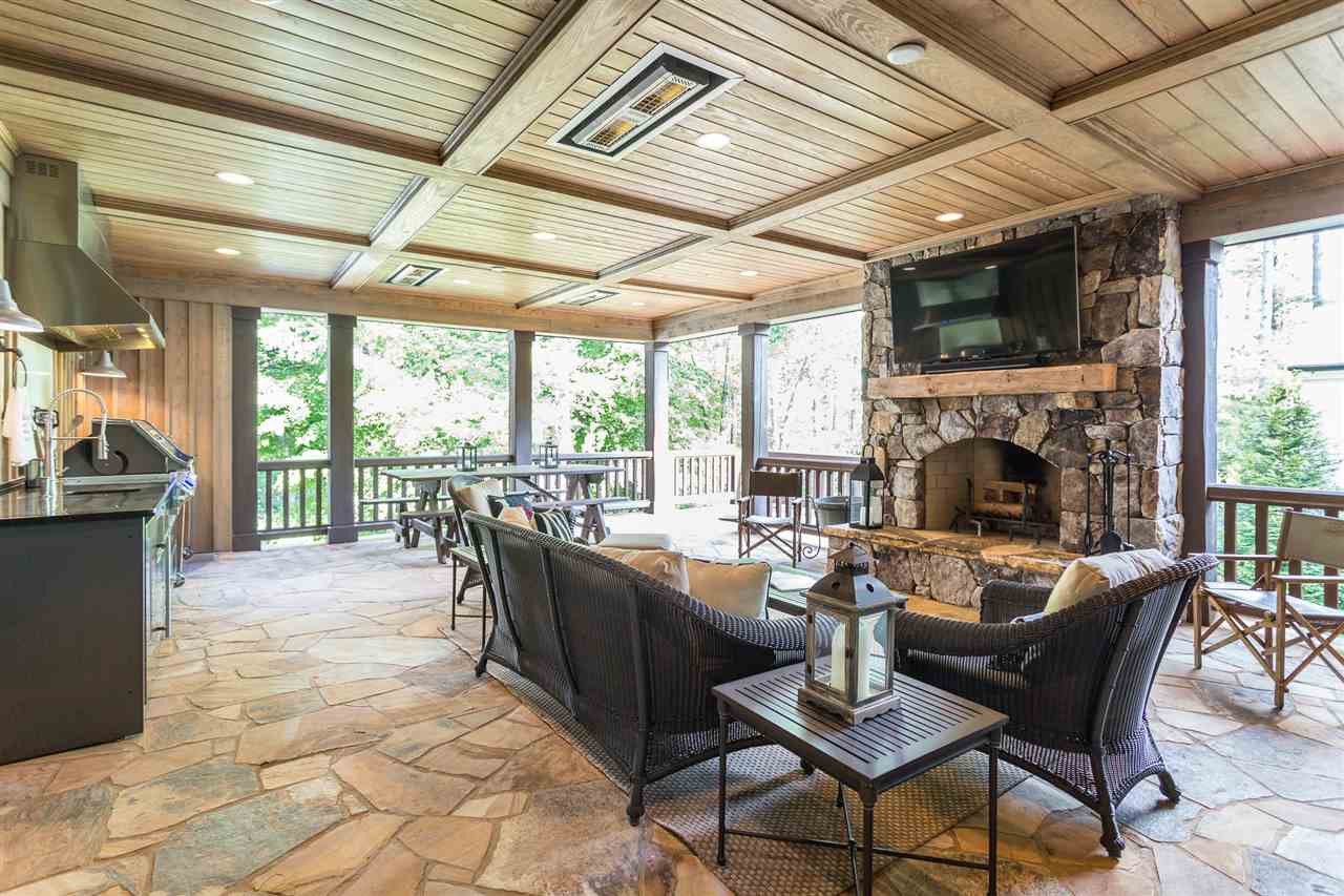 1613 10th Avenue Raleigh, NC 27607 - Photo 6 of 30 a living room with fireplace furniture and a large window