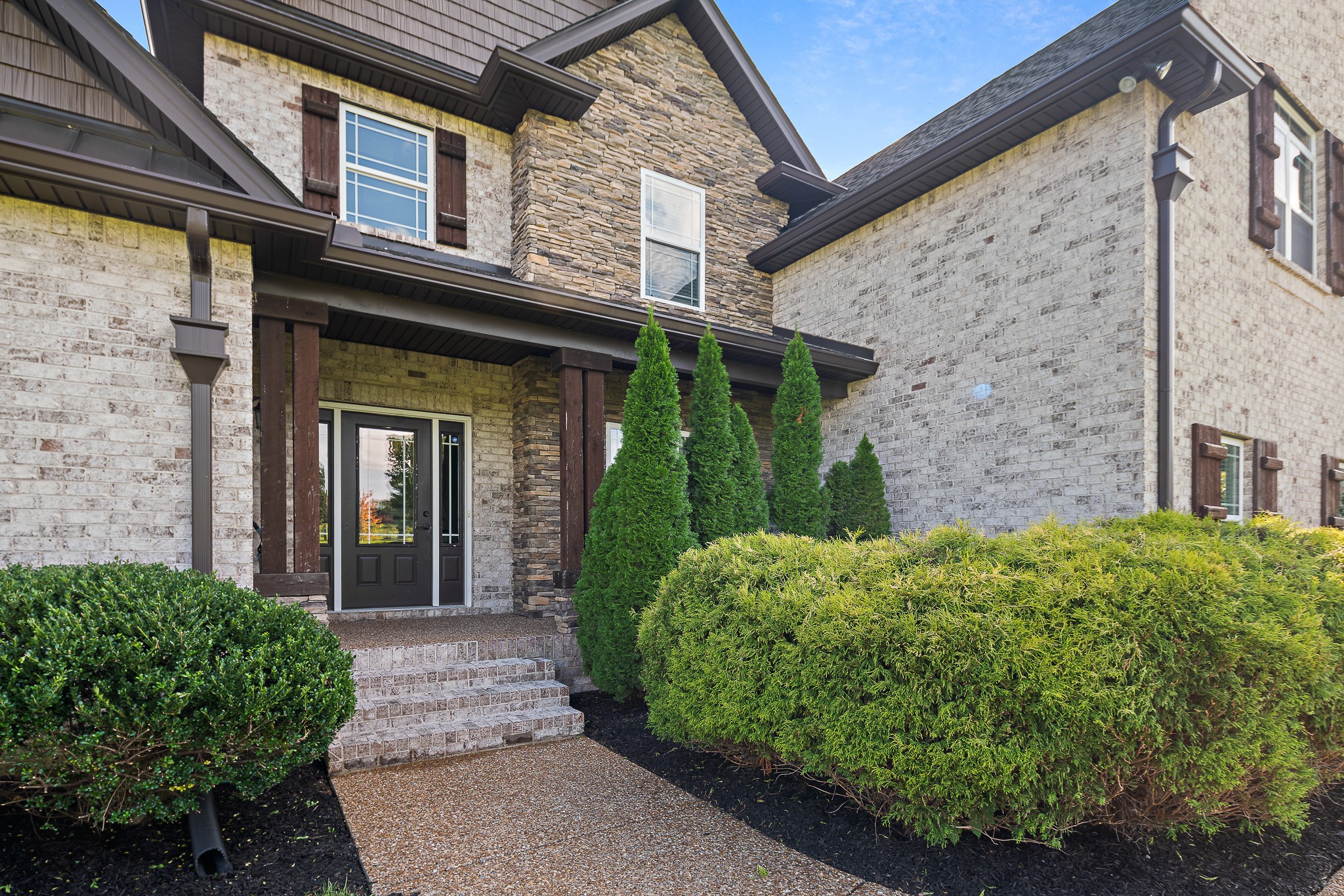 330 Bates Road Lebanon, TN 37087 - Photo 2 of 53 a view of a brick house with a large windows