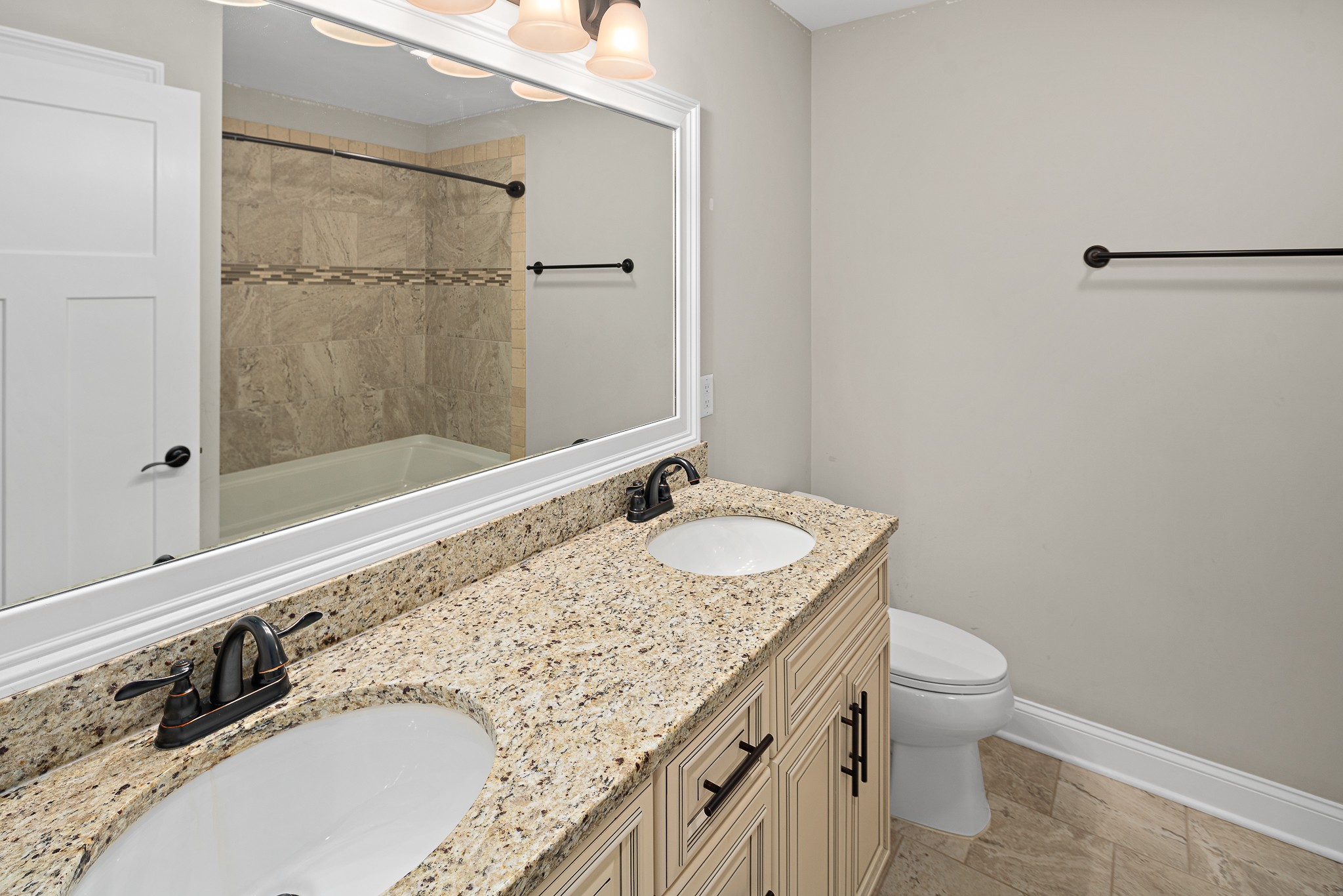 330 Bates Road Lebanon, TN 37087 - Photo 31 of 53 a bathroom with a granite countertop sink a toilet and shower